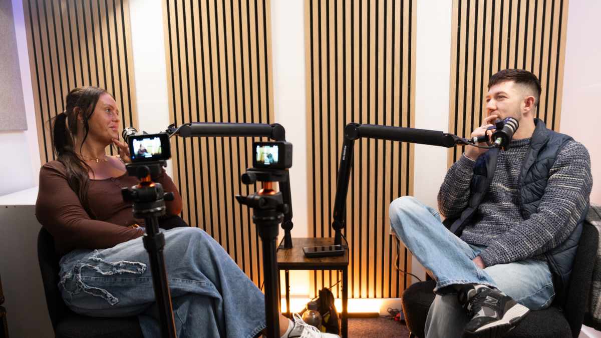 Pop-art illustration of a podcast studio setup with microphones and planning notes